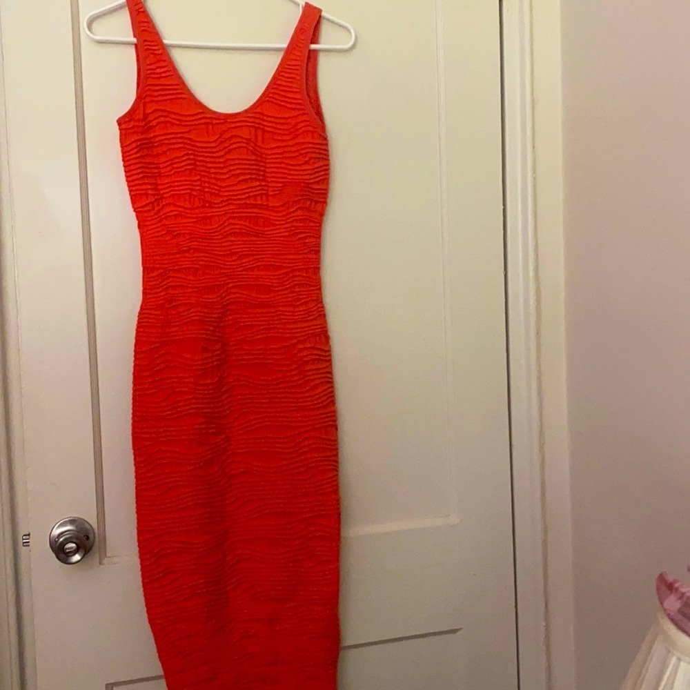 Orange stretchy tight fit dress size: M/L